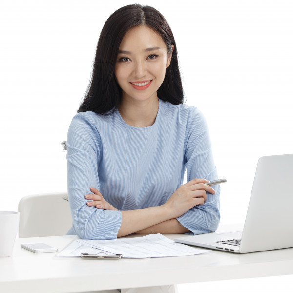 Woman teacher smiling with laptop